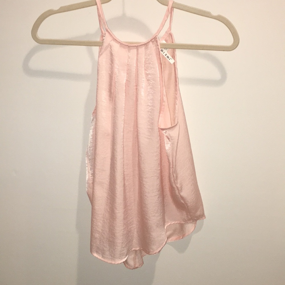 Francesca’s pink tank top